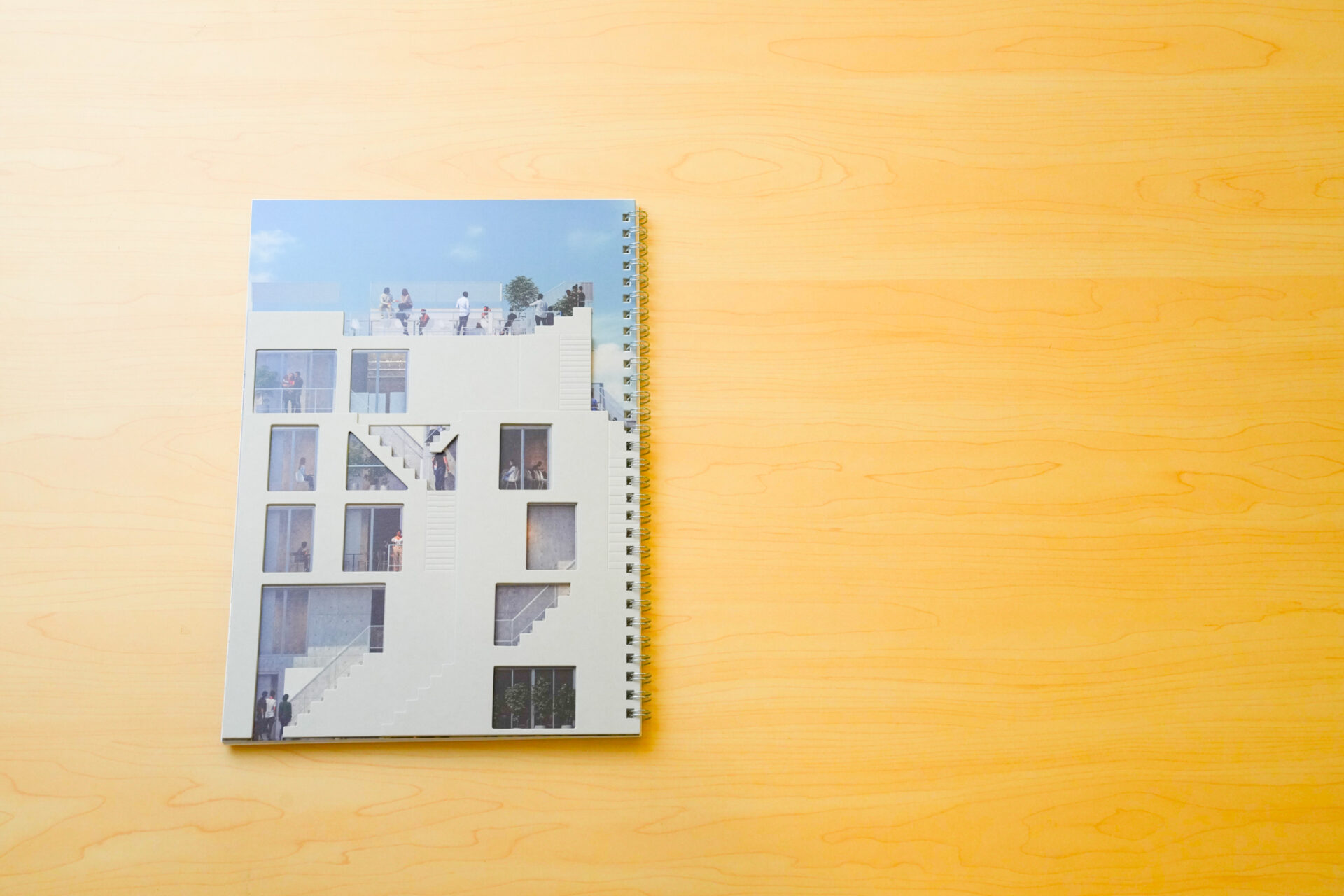 宇田川町不動産プロジェクト「udagawa kaidan」ブランドブック（特装版）。表紙は物件の世界観を反映した型抜き用紙を使用。